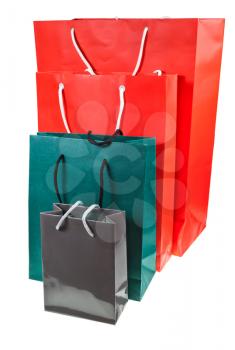 different paper shopping bags isolated on white backgrounds
