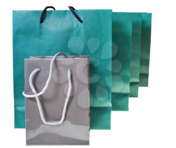 several paper shopping bags isolated on white backgrounds