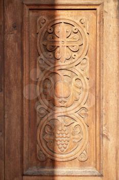 old carved wooden doors in Tatev Monastery in Armenia