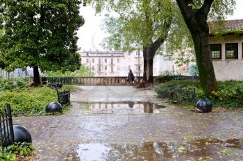 autumn park with rainy puddle in Padua, Italy
