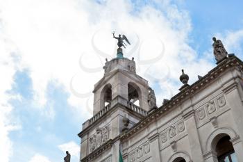 statue on tower of city hall Palazzo moroni in Padua, Italy