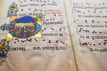 medieval folio with Benedictine chant notes for church service