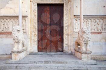 doors of medieval Modena Cathedral, Italy