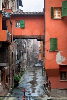 view of the window on the canal on Via Piella, in Bologna, Italy. Open air stretch of the city's canal which still runs under the town.