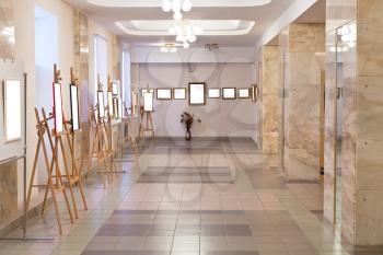 simple art gallery hall with cut out picture frames
