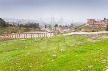 panorama of ancient city Gerasa and modern Jerash , Jordan