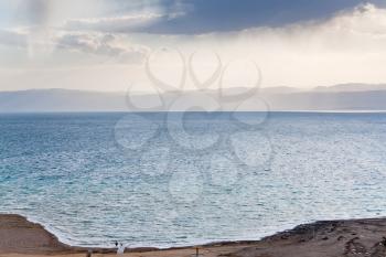 sand beach on Dead Sea coast in Jordan in evening