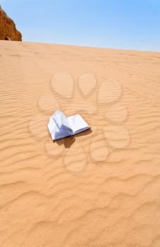 note book on sand dune hill of Wadi Rum desert, Jordan