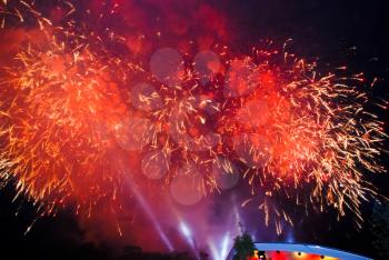 multicolored fireworks in dark night sky