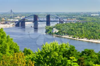 panorama of Kiev with Podilsko-Voskresenskyi Bridge on Dnieper River in Kiev, Ukraine