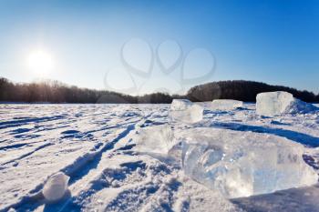 frozen winter landscape with ice blocks