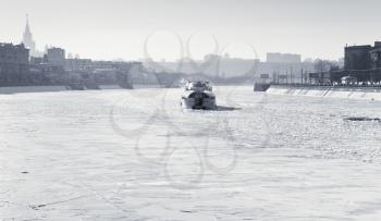 iceboat on frozen Moscow river in sunny winter day