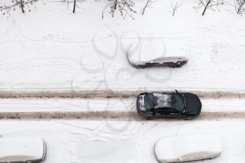 top view of snow road in residential district in Moscow, Russia