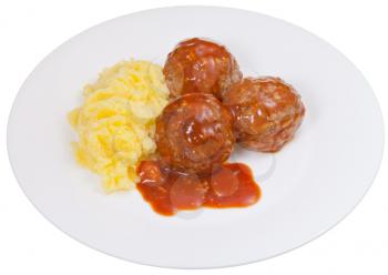 three roasted meatballs under meat sauce and mashed potato on plate isolated on white background