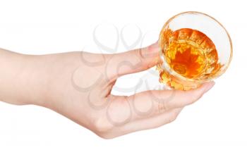 top view of hand holding glass of dessert wine isolated on white background