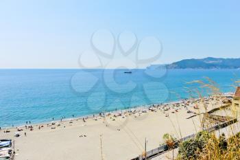 sand beach on Ligurian sea near Savona city, Italy