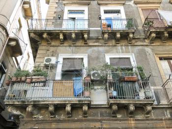 facade of an apartment building in the center of Catania, Sicily, Italy