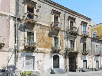 facade of an urban house in center of Catania, Sicily, Italy