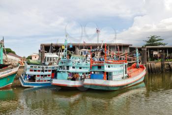 living ships on chao phraya river in bangkok, thailand