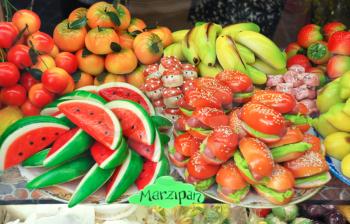 many sweet dessert marzipan on street market