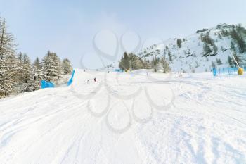 snow mountain ski tracks in skiing area Via Lattea (Milky Way), Sestriere, Italy