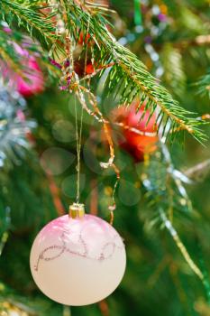pink ball and red ball christmas tree vintage decoration close up