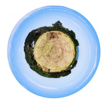 little planet - spherical view of country field with straw stack near small Breton village isolated on white background