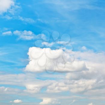 blue autumn sky with white cumulus clouds - natural background