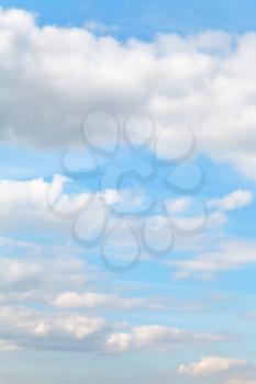 blue autumn sky with cumulus clouds - natural background
