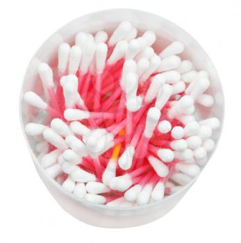 Many pink cotton swabs in round container isolated on white background