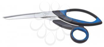 closed modern sewing scissors with black and blue handles isolated on white background