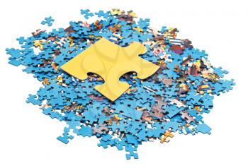 big puzzle piece on pile of disassembled blue jigsaw puzzles isolated on white background