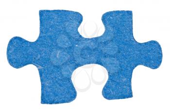 cardboard piece of jigsaw puzzle close up isolated on white background