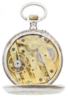 top view of brass movement of vintage pocket watch isolated on white background