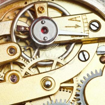brass mechanical clockwork of retro watch close up