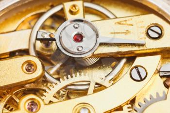 brass mechanical movement of retro watch close up