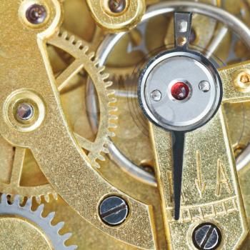 brass mechanical clockwork of vintage clock close up