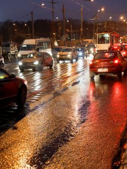 car driving in rainy evening in Moscow