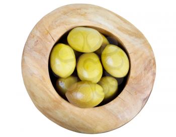 above view of green olives in wooden bowl isolated on white background