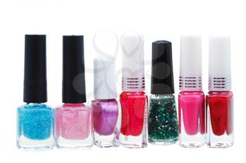 set of various nail polish isolated on white background