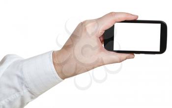 businessman hand shooting by smartphone with cut out screen isolated on white background