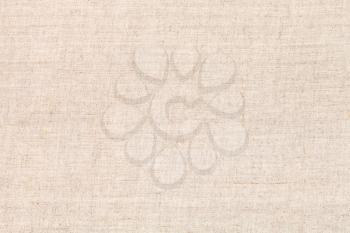 natural textile background from unpainted woven linen fabric