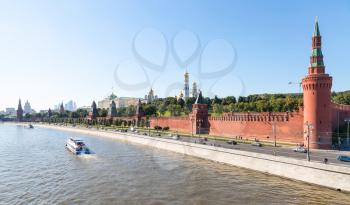 Moscow skyline - view of Beklemishevskaya Tower and Kremlin Walls, The Kremlin embankment, Kremlin buildings In Moscow in summer afternoon