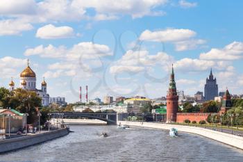 Moscow skyline - Bolshoy Kamenny Bridge on Moskva River, Embankments, Kremlin Towers, Cathedral of Christ the Saviour in Moscow, Russia in summer day
