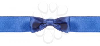 symmetrical blue bow knot on wide silk ribbon isolated on white background