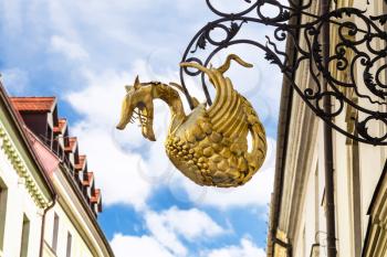 travel to Bratislava city - dragon sign figure on street in old town of Bratislava