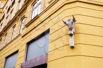travel to Brno city - street sculpture on wall of apartment house in Brno old town, Czech