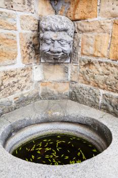 travel to Brno city - detail of wall decoration of Spilberk castle with water basin, Brno town, Czech