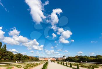 travel to Vienna city - blue sky with white clouds over gardens of Belvedere Palaces, Vienna, Austria