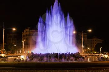 travel to Vienna city - blue illuminated Hochstrahlbrunnen fountain on Schwarzenbergplatz square, Vienna,Austria